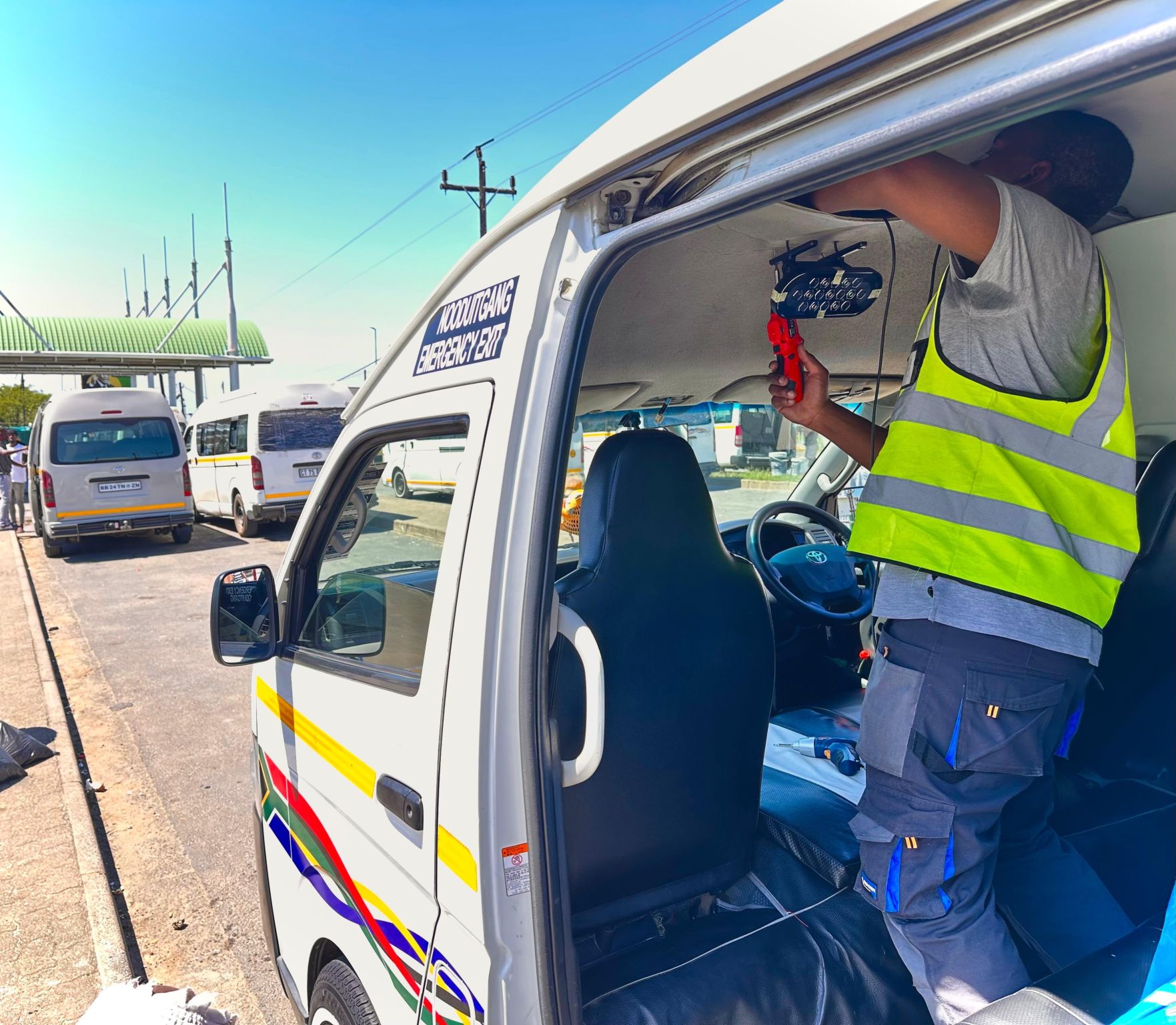 RUTCO technician installing a smart camera in a minibus taxi